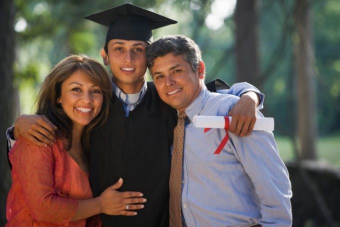 College Grad With Parents E1642567356228 - Education Republic